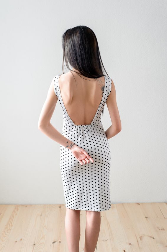 tatouage pissenlit sur l'homoplate d'une femme